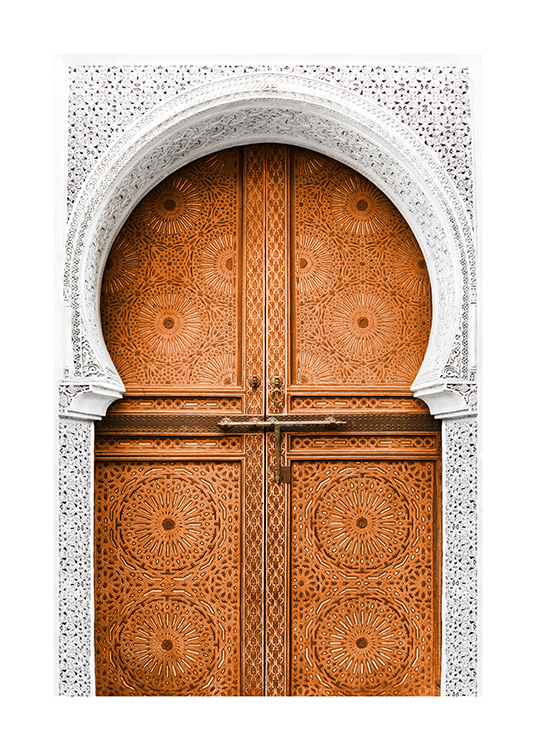 – Photograph of an ockra coloured door surrounded by a white entrance. 