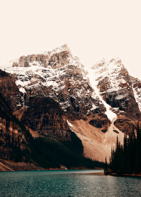 –Photograph of a mountain by the lake. 