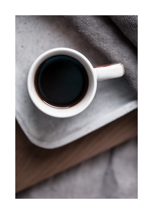 – Photograph of black coffee in neutral colours 
