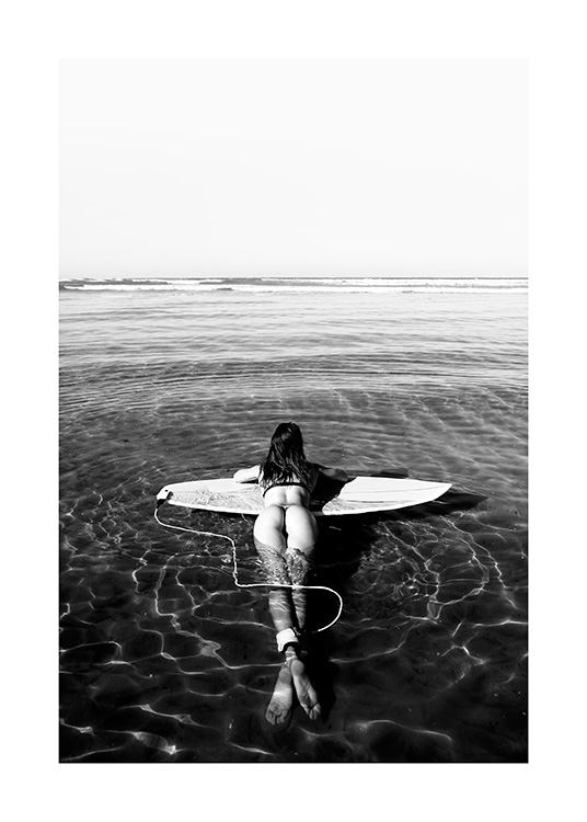 Floating on Surfboard Poster / Black & white at Desenio AB (12651)