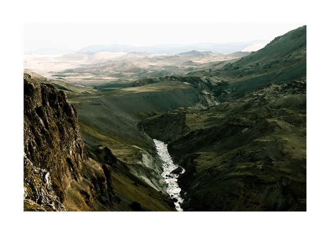  - Photograph of green landscape with mountains and river in Iceland