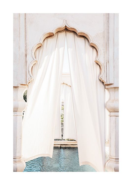  - Photograph of a curved door arch with white curtains in front of a pool