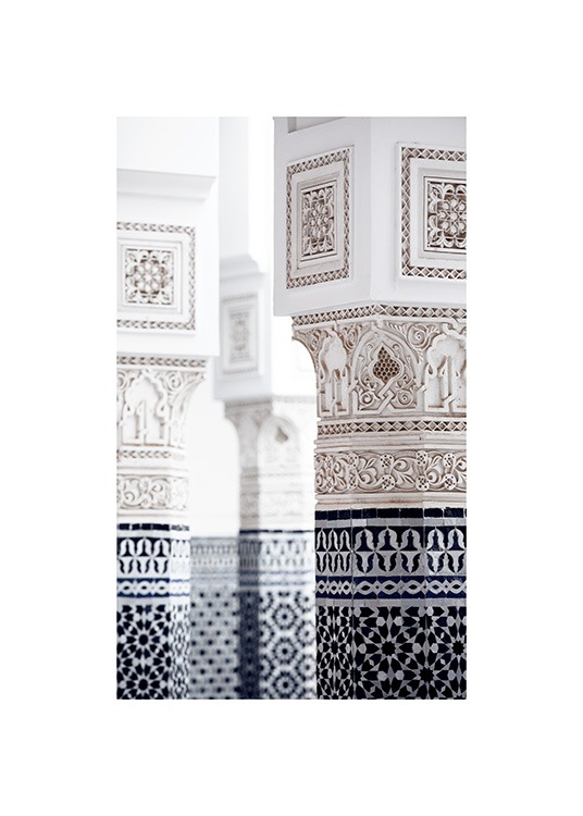  - Photograph of pillars with white and blue patterns