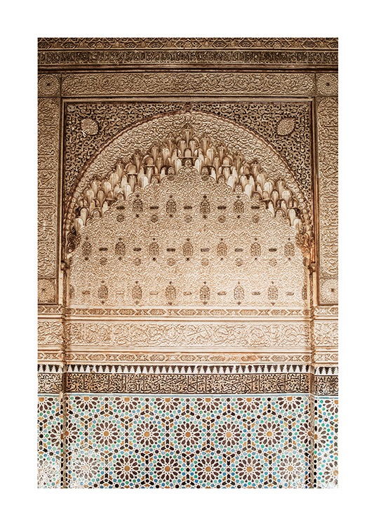 - Photograph of a golden wall with carvings and a pattern in mosaic at the bottom