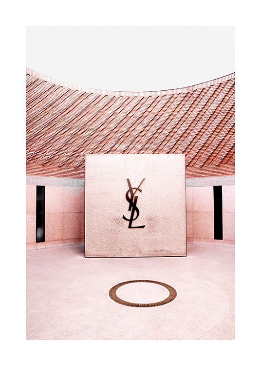  – Photograph of the YSL logo inside a pink room of the YSL Fashion Museum