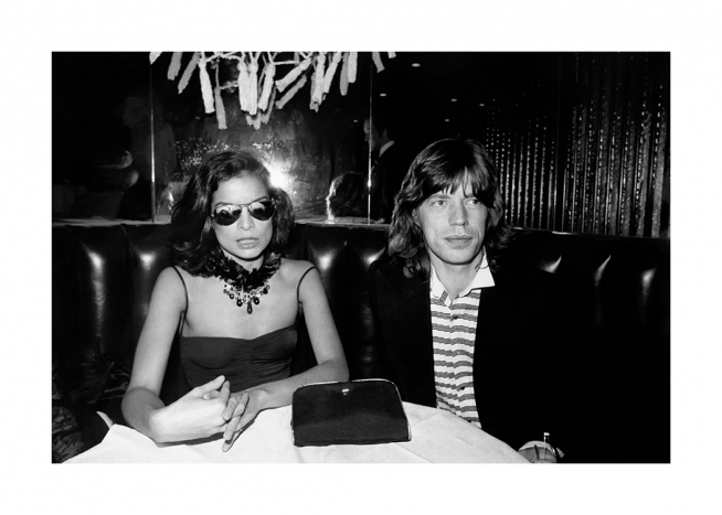  – Black and white photograph of Mick and Bianca Jagger, seated in a booth at Studio 57
