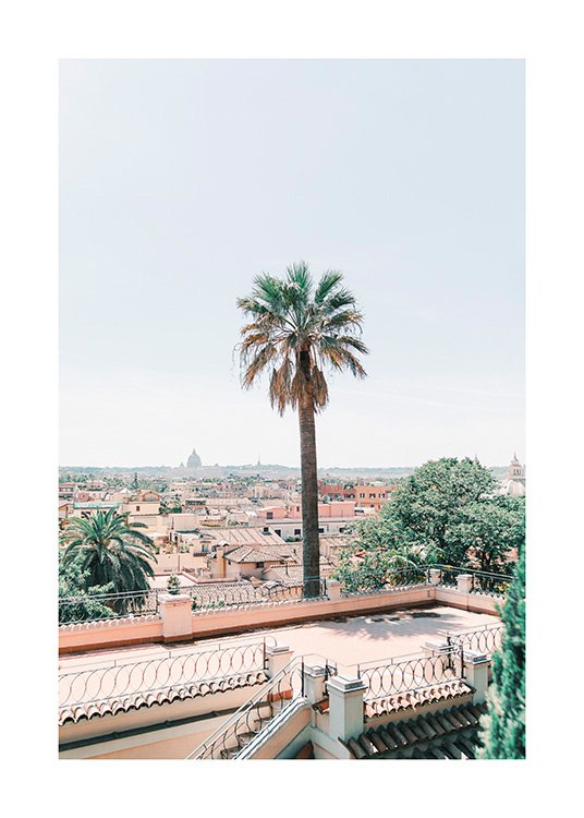  – Photograph of a terrace surrounded by trees with a view of Rome in the background
