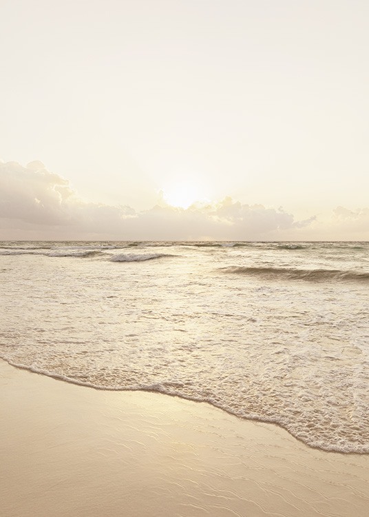  – Photograph of a beach and ocean during the golden hour