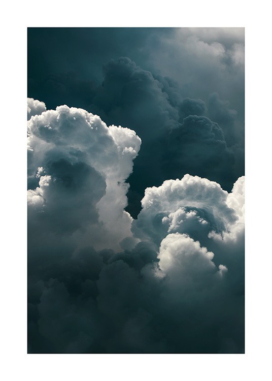  – Photograph of clouds in a stormy, dark grey sky