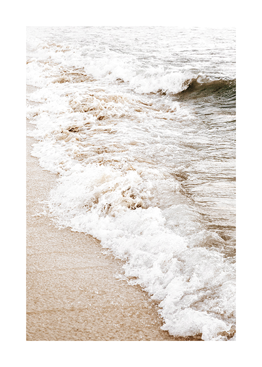  – Photograph of a beach and ocean waves washing up on the shore