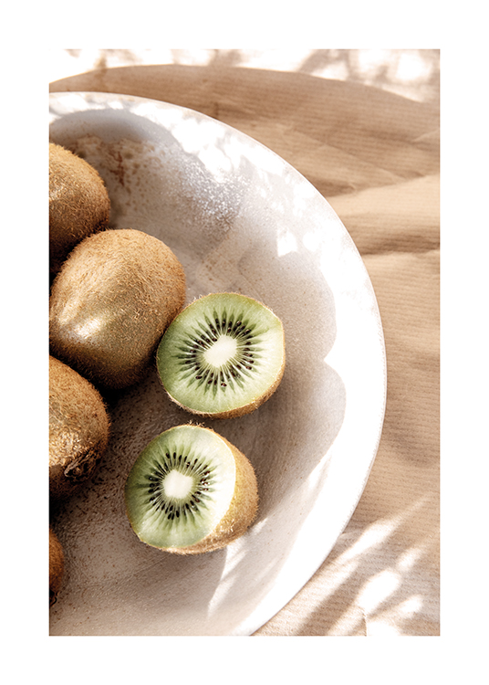  – Photograph of a bunch of kiwi fruits in a bowl