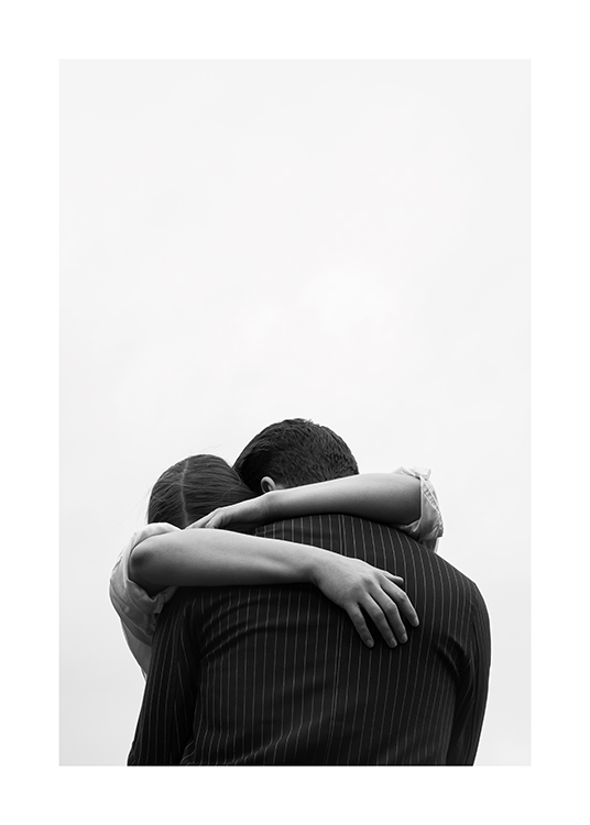  – Black and white photograph of a couple embracing each other