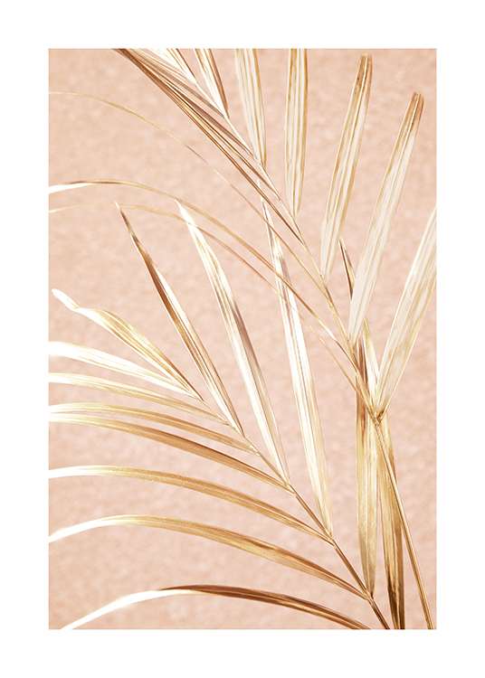  – Photograph of thin leaves in gold against a background in a peachy-pink tone