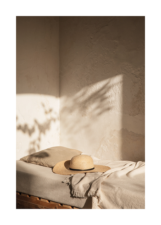  – Shadows in soft light cast against a bed