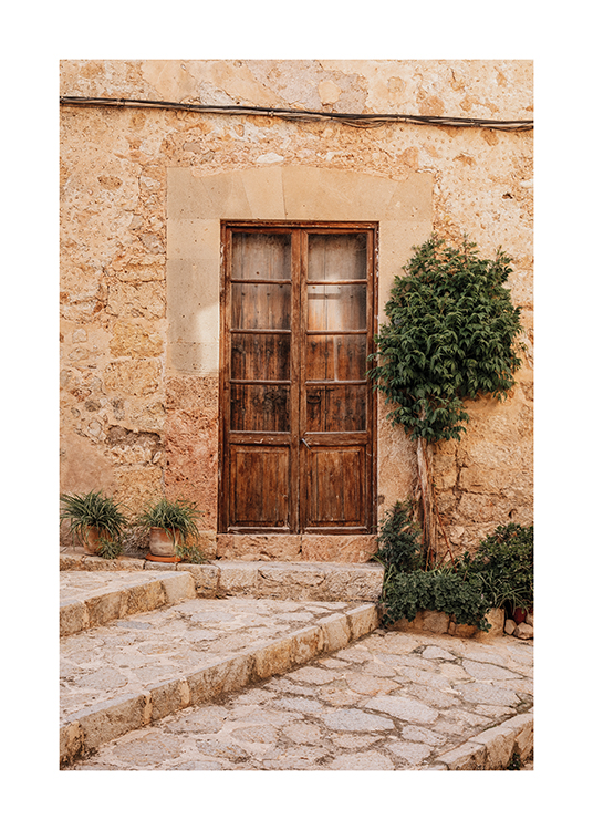  – A rustic wooden door in a Mallorcan town