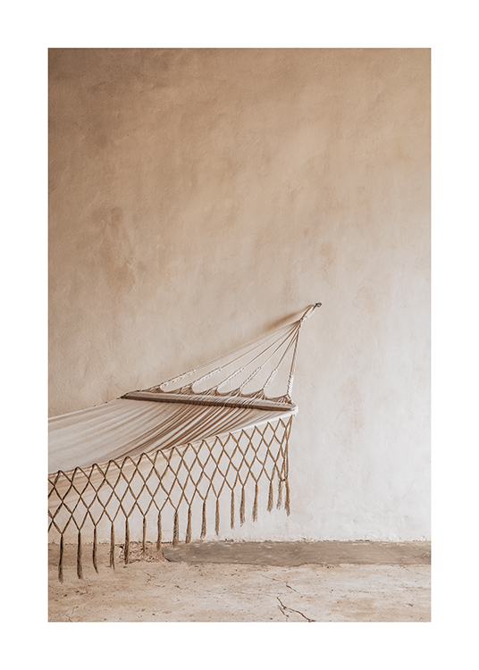  – A photograph of a hammock hanging from a rustic wall