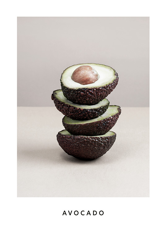  – Photograph of half avocados balancing on top of each other against a grey background