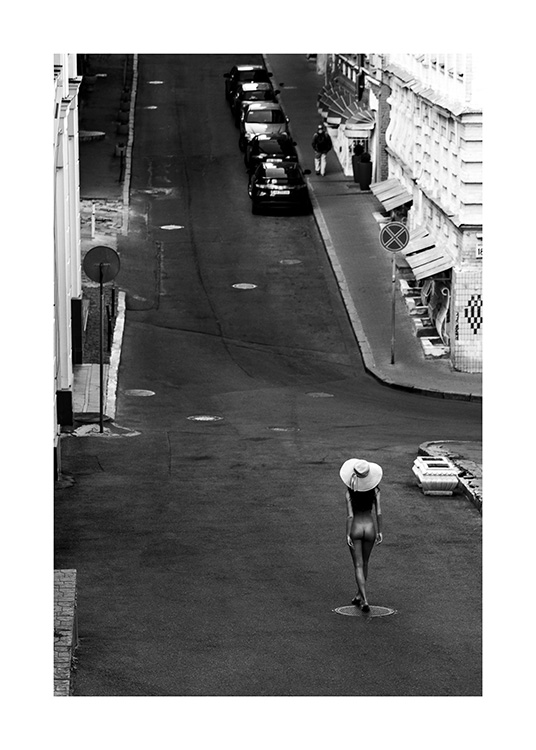 – A cool monochrome city print of a woman walking nude on the empty street