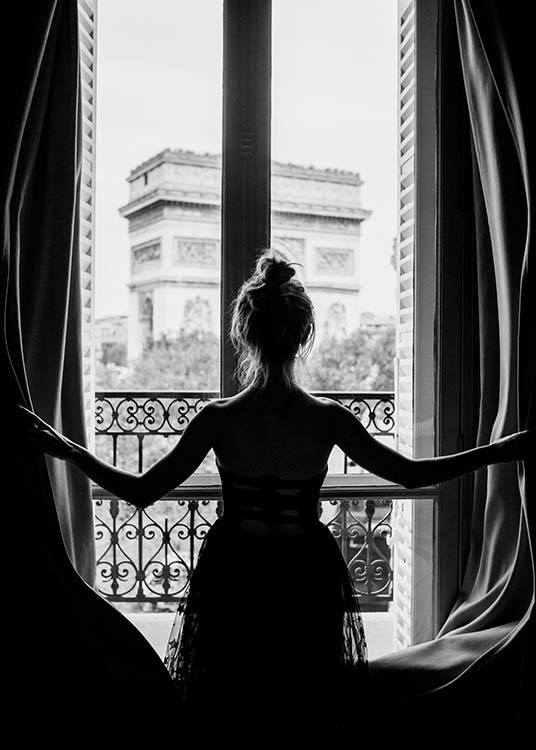  – Black and white photograph of a woman in a window with the Arc de Triomphe in the background