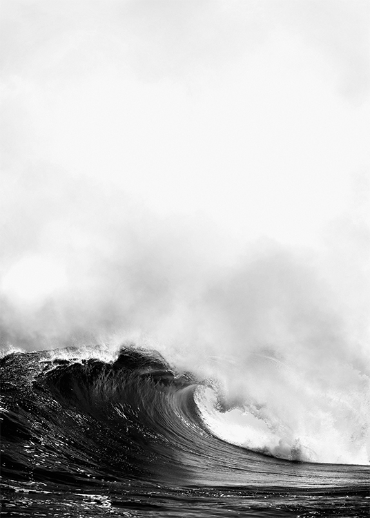 – Black and white photograph of a large ocean wave
