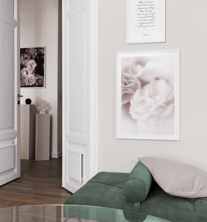 Botanical posters and text posters for living room with green daybed