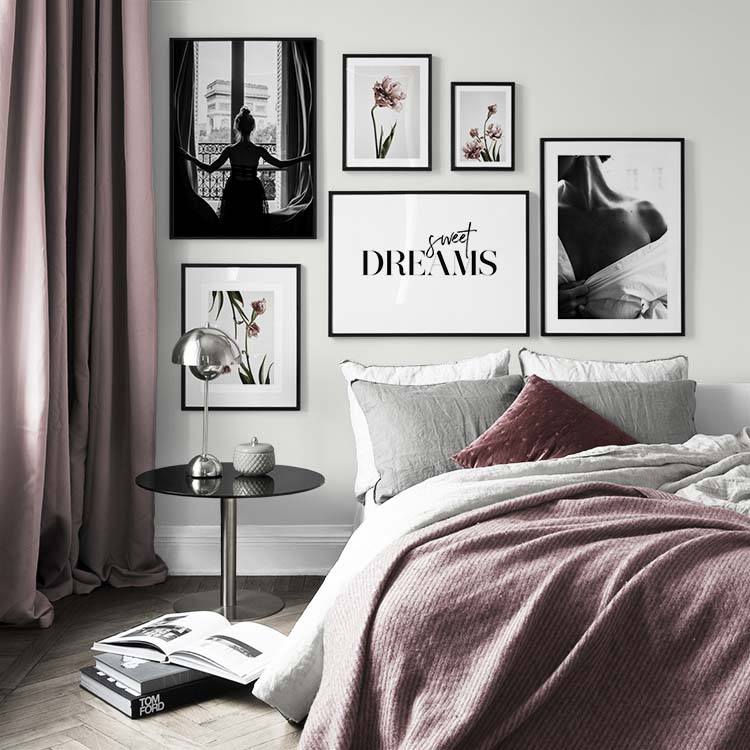 Black-and-white posters in modern bedroom