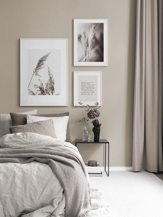 Beige photo art in bedroom