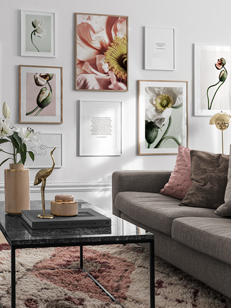 Floral posters from Desenio. Wall with framed posters of flowers and other plants.